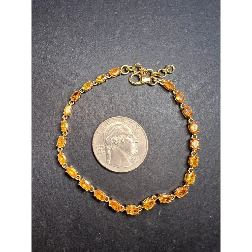 Yellow spessartine garnet tennis bracelet in gold over sterling silver